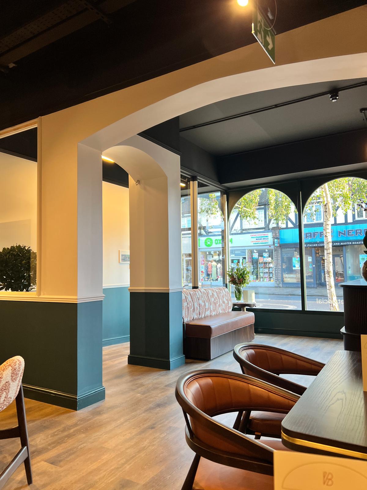 Arched window seating looking out to the high street
